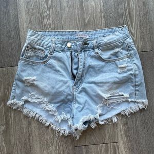 Pale blue ripped high waisted jean shorts- medium